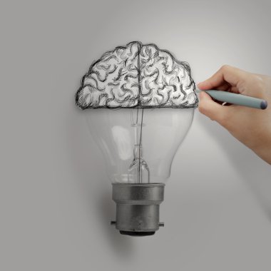 Light bulb with hand drawn brain as creative idea concept  clipart
