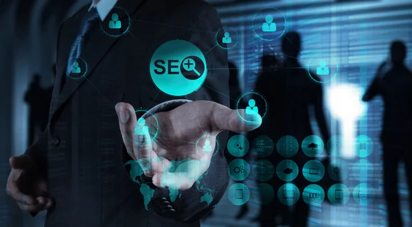 Double exposure of businessman hand showing search engine optimi — Stock Photo, Image
