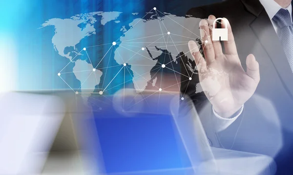 Businessman hand pointing to padlock on touch screen computer as — Stock Photo, Image