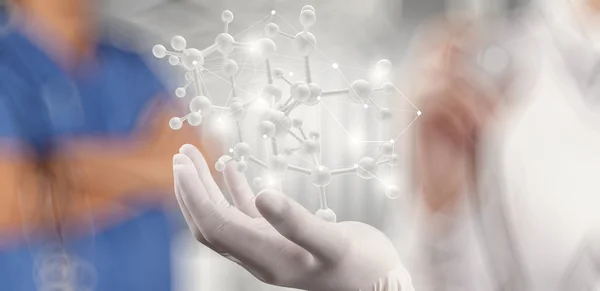 Scientist doctor hand holds virtual molecular structure in the l — Stock Photo, Image