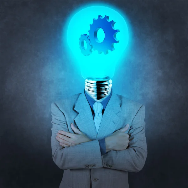 Businessman has  light bulb haed with gears as concept — Stock Photo, Image