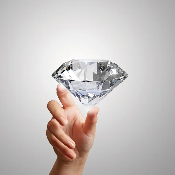 Mano celebración 3d diamante sobre fondo blanco — Foto de Stock