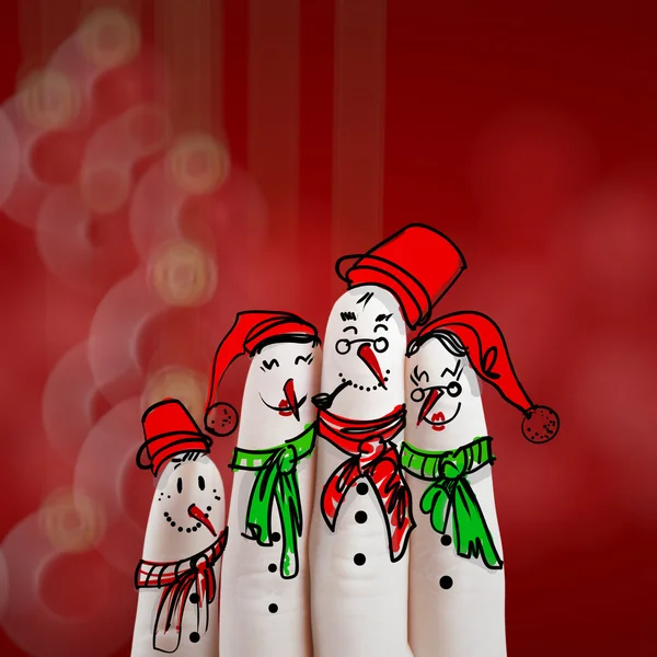 A lovely family hand drawn and finger of snowmen on blur backgro — Stock Photo, Image