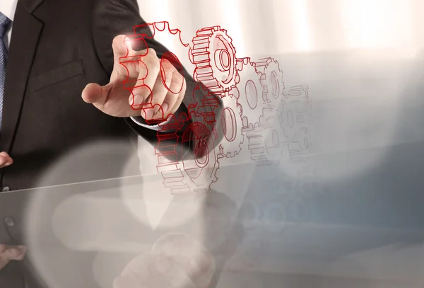 Businessman hand draws gears — Stock Photo, Image