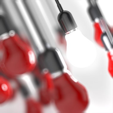 yaratıcı fikir ve liderlik kavramı ampul üzerinde gri backgrou