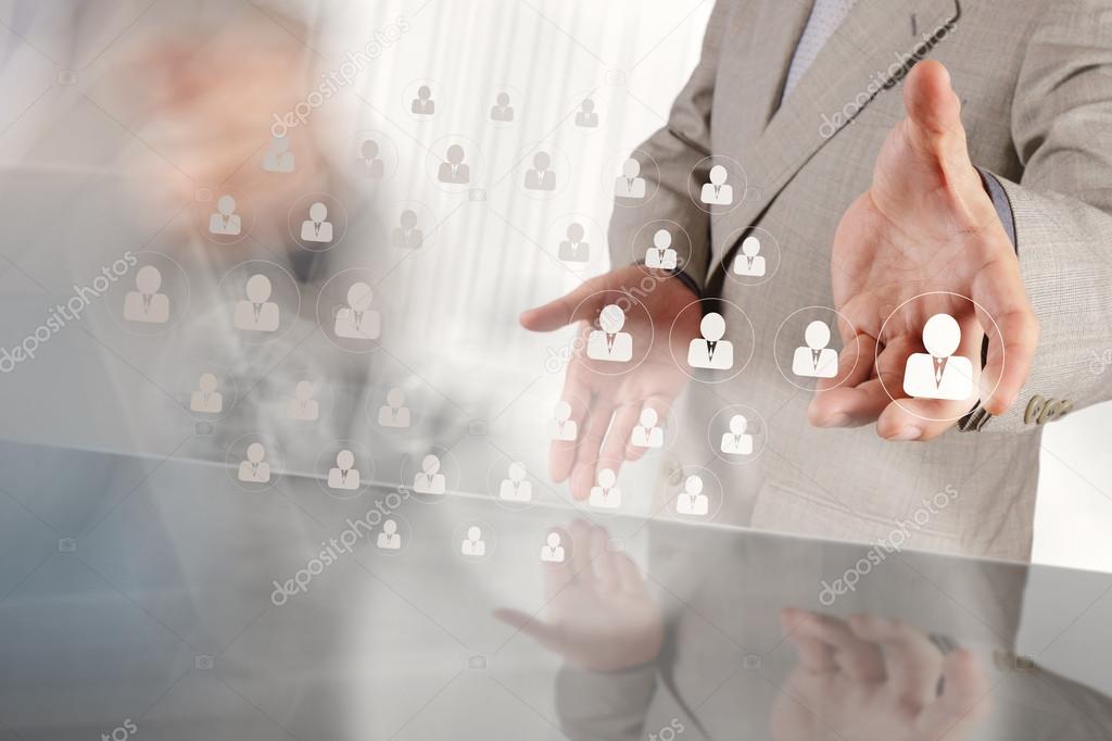 hand choosing people icon as human resources concept 