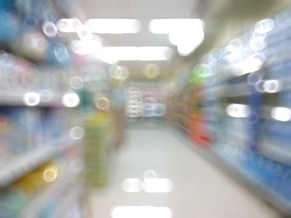 Supermarket with blurred bokeh background — Stock Photo, Image