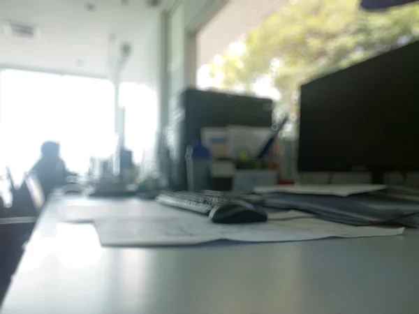 Abstrakt office med dator oskärpa bakgrund — Stockfoto