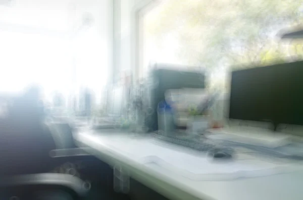 Abstract office with computer blur background — Stock Photo, Image