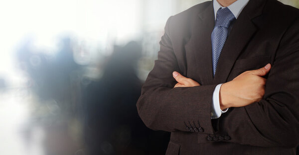 business man success with his office background as concept
