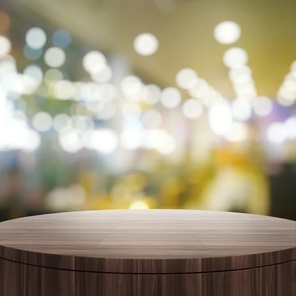 Leerer hölzerner runder Tisch und verschwommener Hintergrund für Produktpräs — Stockfoto