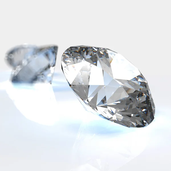 Diamantes sobre fundo branco — Fotografia de Stock