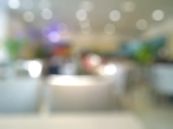 Supermercado com fundo bokeh borrado — Fotografia de Stock