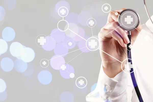 Smart medical doctor hand showing network with bokeh exposure as — Stock Photo, Image