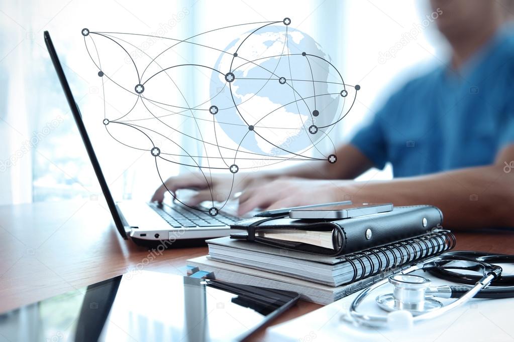 Doctor working with laptop computer in medical workspace office 