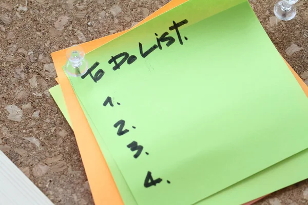 Close up of pin and to do list word on sticky note with cork boa — Stock Photo, Image