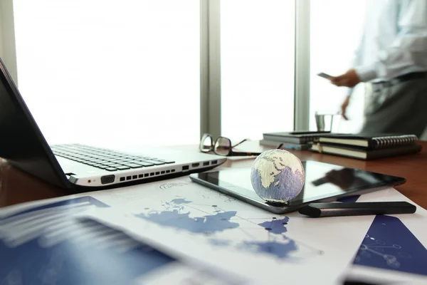 Business documents on office table with texture the world on dig — Stock Photo, Image