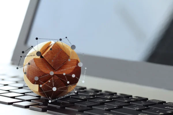 Wooden texture globe with social media diagram on laptop compute — Stock Photo, Image