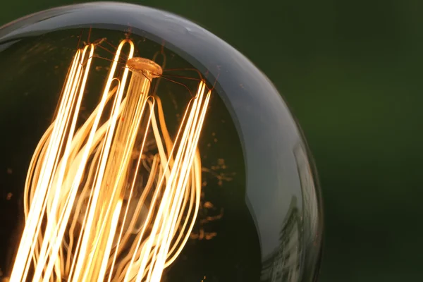 Close up of vintage light bulb as creative concept — Stock Photo, Image