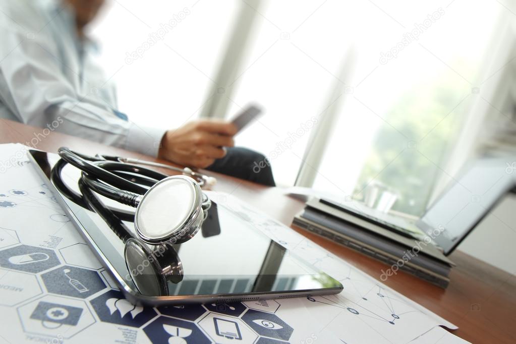 Doctor working with laptop computer in medical workspace office 