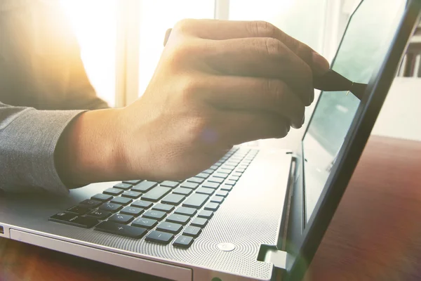 Business man hand working with laptop computer and touching on s — Stock Photo, Image