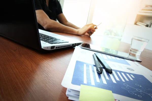 Young creative designer man working at office and social network — Stock Photo, Image