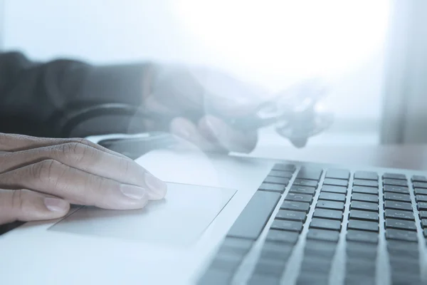 Doctor working with digital tablet and laptop computer in medica — Stock Photo, Image