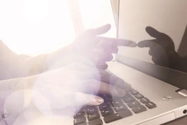 Close up of business man hand working on laptop computer with so — Stock Photo, Image