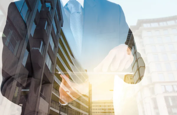 Double exposure of success businessman with abstract building — Stock Photo, Image