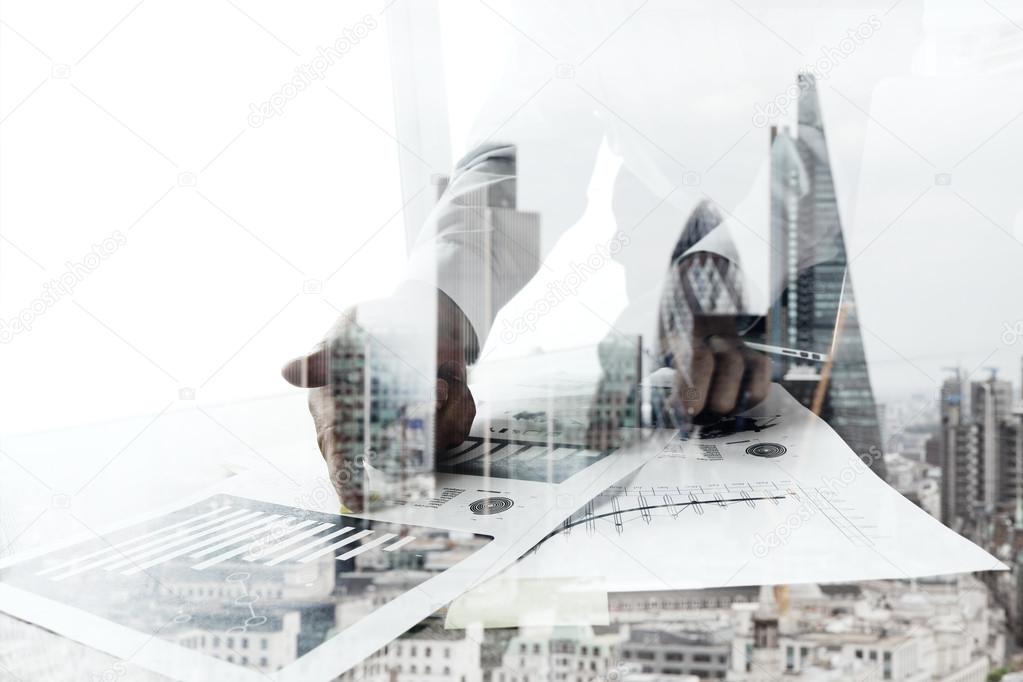 Double exposure of businessman working with new modern computer 