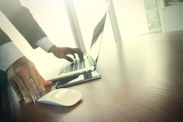 Close up of male hands on mouse and over black keyboard of lapto — 스톡 사진