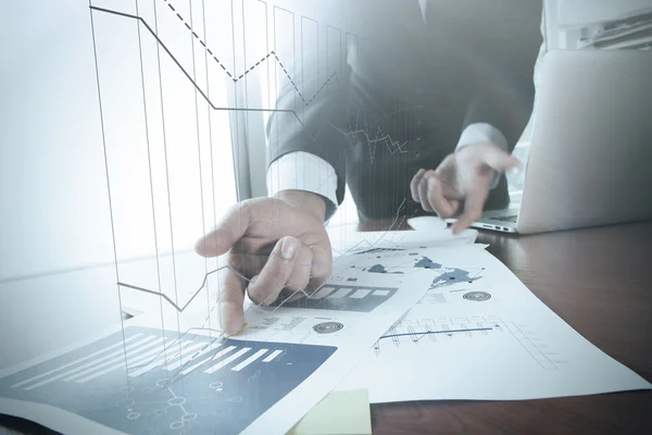 Close up of business man hand working on laptop computer with bu — Stock Photo, Image