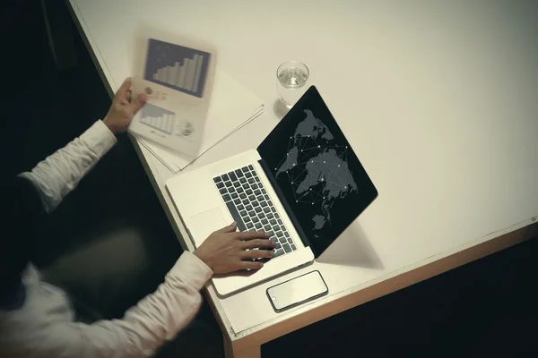 top view of man working with business documents on office table