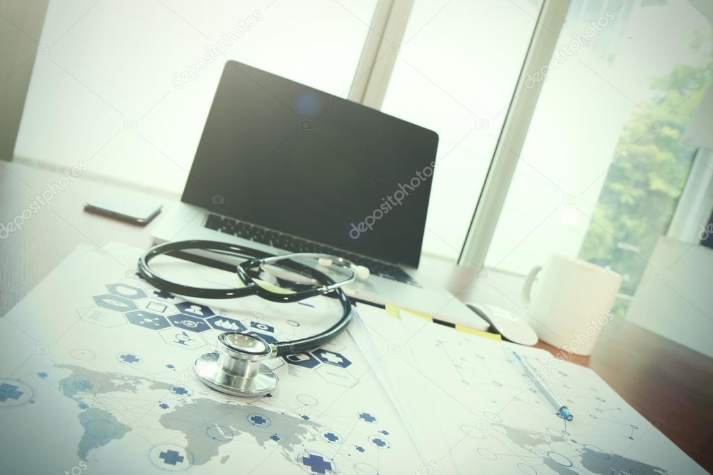 Doctor workspace with laptop computer in medical workspace offic
