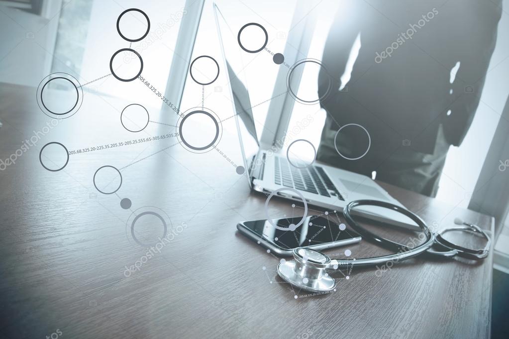 Doctor working with laptop computer in medical workspace office 