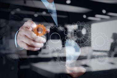 Double exposure of business businessman hand shows gear to succe