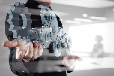 Double exposure of business businessman hand shows gear to succe