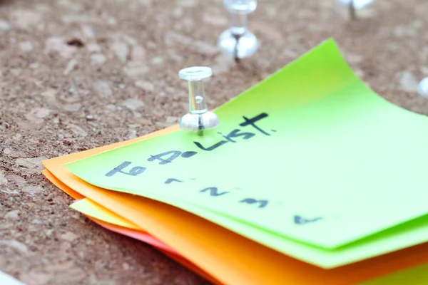 Close up of pin and to do list word on sticky note with cork boa — Stock Photo, Image