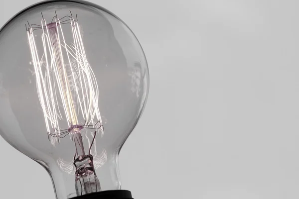 Close up of vintage light bulb as creative concept — Stock Photo, Image