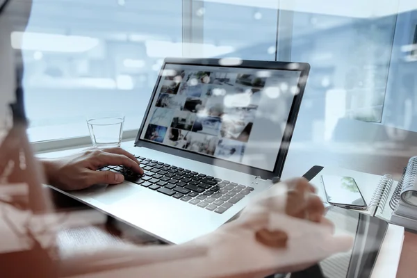 Double exposure of business man hand working on laptop computer — Stock Photo, Image