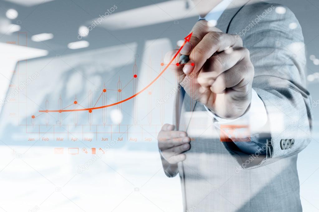 businessman hand drawing virtual chart business 