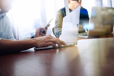 businessman hand working with new modern computer and business strategy