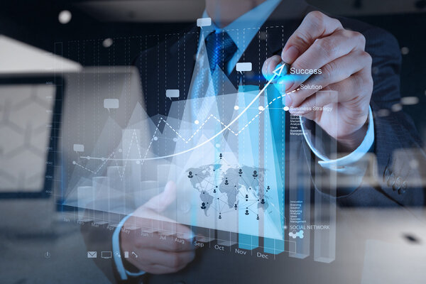 business man hand working with new modern computer and business s
