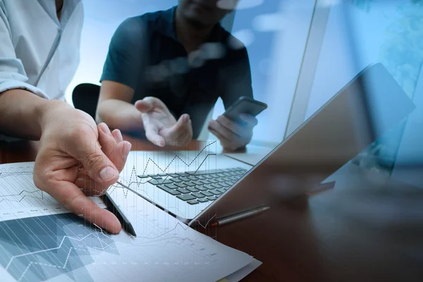 Businessman hand working with new modern computer and business strategy — Stockfoto