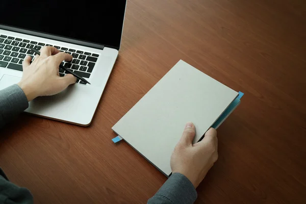 Top view of Double exposure of businessman hand working with new — Stock Photo, Image