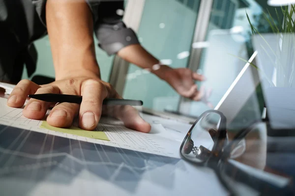 Businessman hand working with new modern computer and business s — Stock Photo, Image