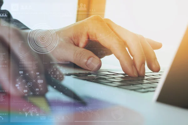 Close up of business man hand working on laptop computer with di — Stock Photo, Image