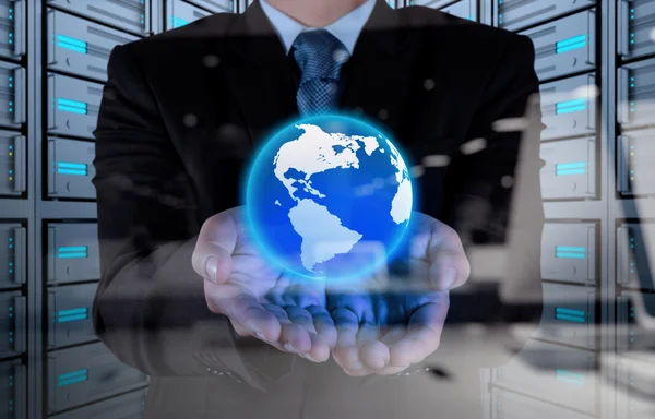 Businessman hand working with new modern computer show the earth — Stock Photo, Image