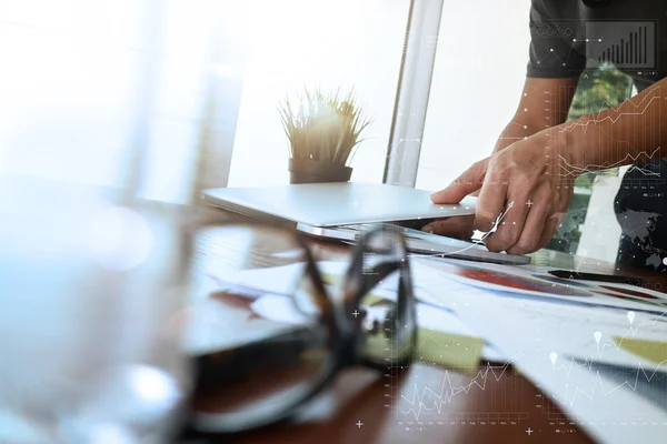 Businessman hand working with new modern computer and business s — Stock Photo, Image