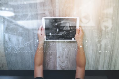 top view of Designer hand working with digital tablet computer a